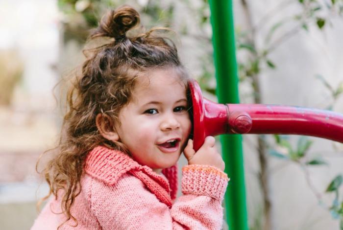 Girl playing on park