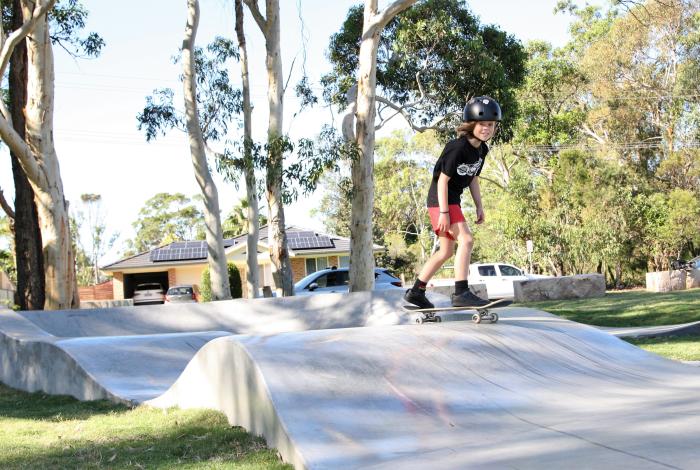 Photo of young person riding a skate board